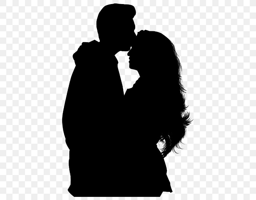 couple silhouette hugging